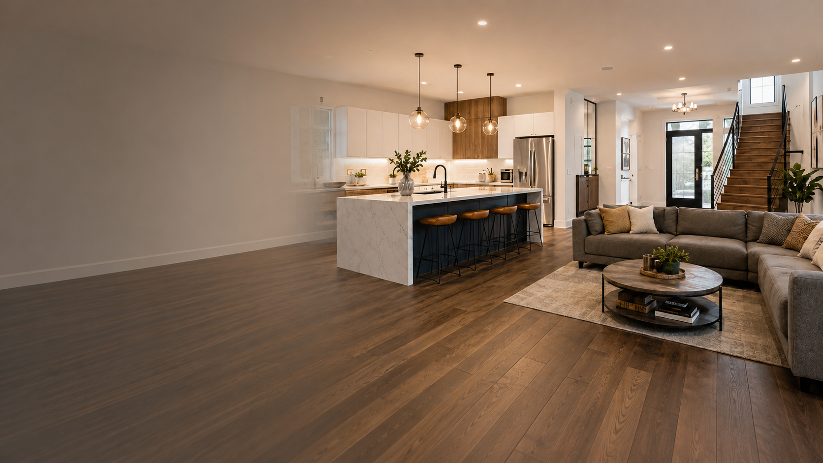 Renovated open-plan kitchen and living space with hardwood flooring